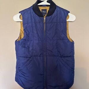 GAP Kids Navy puffer vest with khaki interior.